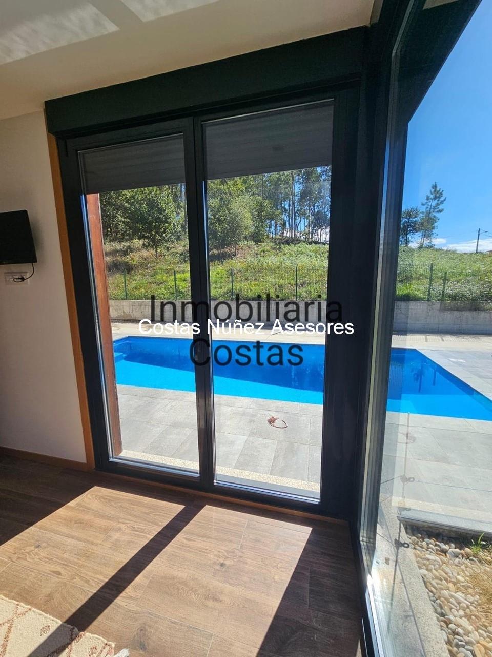 Foto 19 TOMIÑO CÉNTRICA, CON PISCINA, FINCA LLANA Y SOLEADA. MODERNA CASA EN UNA PLANTA