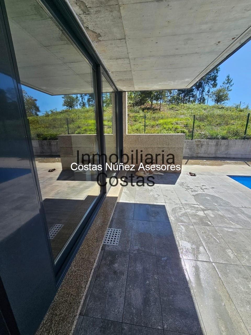 Foto 8 TOMIÑO CÉNTRICA, CON PISCINA, FINCA LLANA Y SOLEADA. MODERNA CASA EN UNA PLANTA